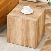 Elevate your living space with this square modern MDF coffee table that showcases smooth, light wood color texture patterns. It is characterized by stylish design.15.7*15.7*15.7