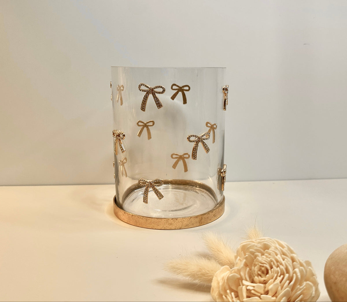 Decorative Glass Hurricane Candle Holder with Gold and Rhinestones Bow Pattern, Clear Cylinder with Metallic Base, 6" tall