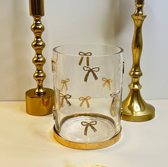 Decorative Glass Hurricane Candle Holder with Gold and Rhinestones Bow Pattern, Clear Cylinder with Metallic Base, 6" tall