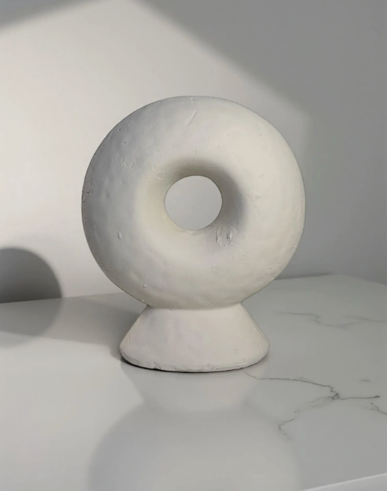 Abstract sculpture made of stone, white donut-shaped vase 13"