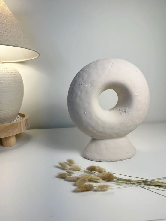 Abstract sculpture made of stone, white donut-shaped vase 13"