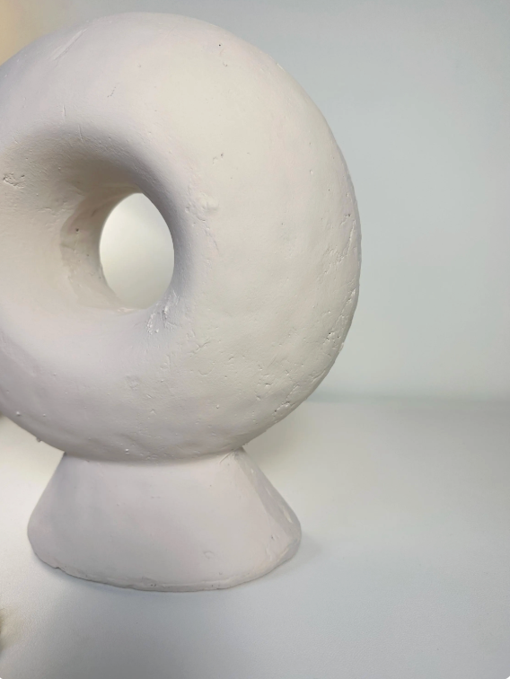 Abstract sculpture made of stone, white donut-shaped vase 13"