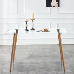 Modern Minimalist Rectangular Glass Dining Table for 4-6 with 0.31" Tempered Glass Tabletop and Wood color Coating Metal Legs - Transparent