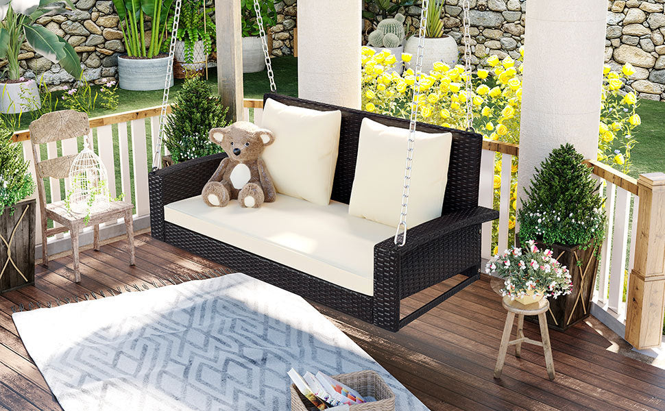 2-Person Wicker Hanging Porch Swing with Chains, Cushion, Pillow, Rattan Swing Bench for Garden, Backyard, Pond (Brown Wicker, Beige Cushion)
